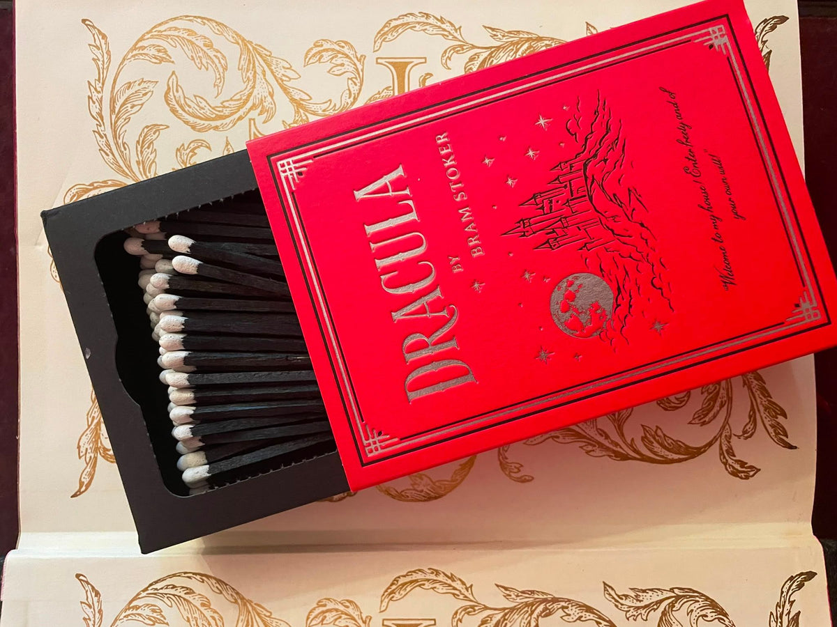 Dracula matchbox open, showing extra-long matches